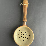 Ladle and sandstone strainer