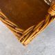 Vintage wicker bottle rack