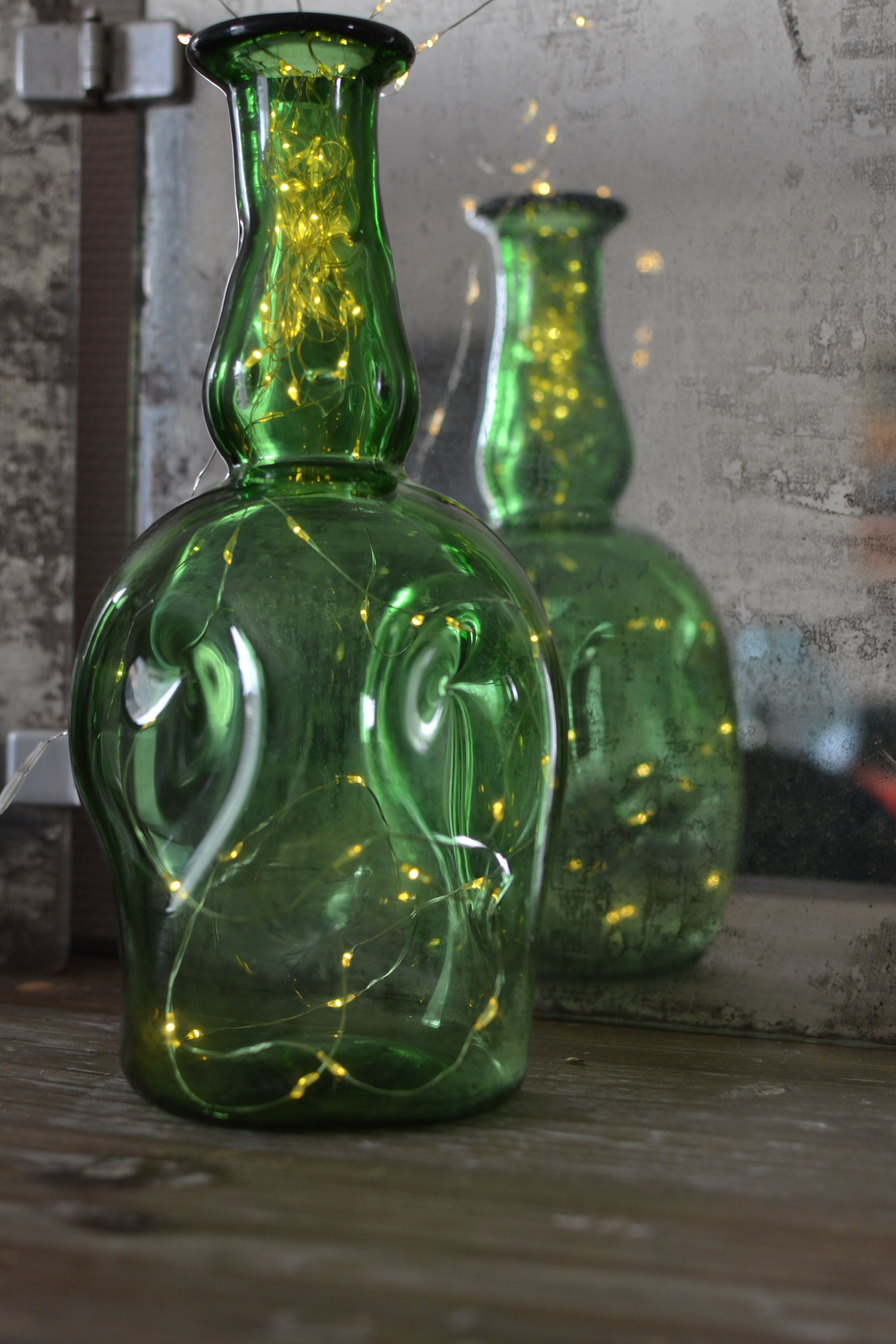 Dented green bottle