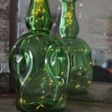 Dented green bottle