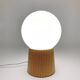 Pair of lamps with wooden base and glass globe, 1970s