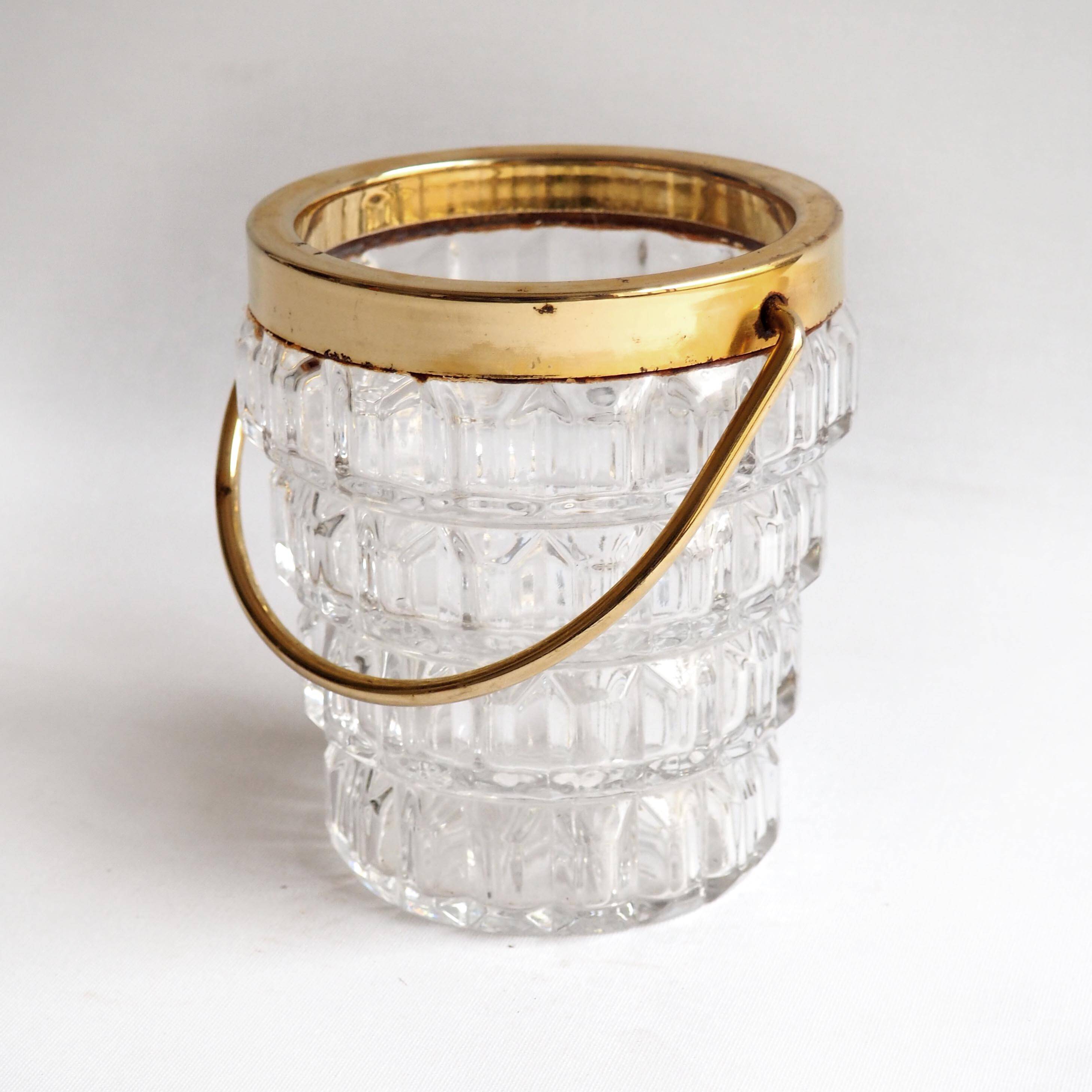 Crystal ice bucket and golden ladle