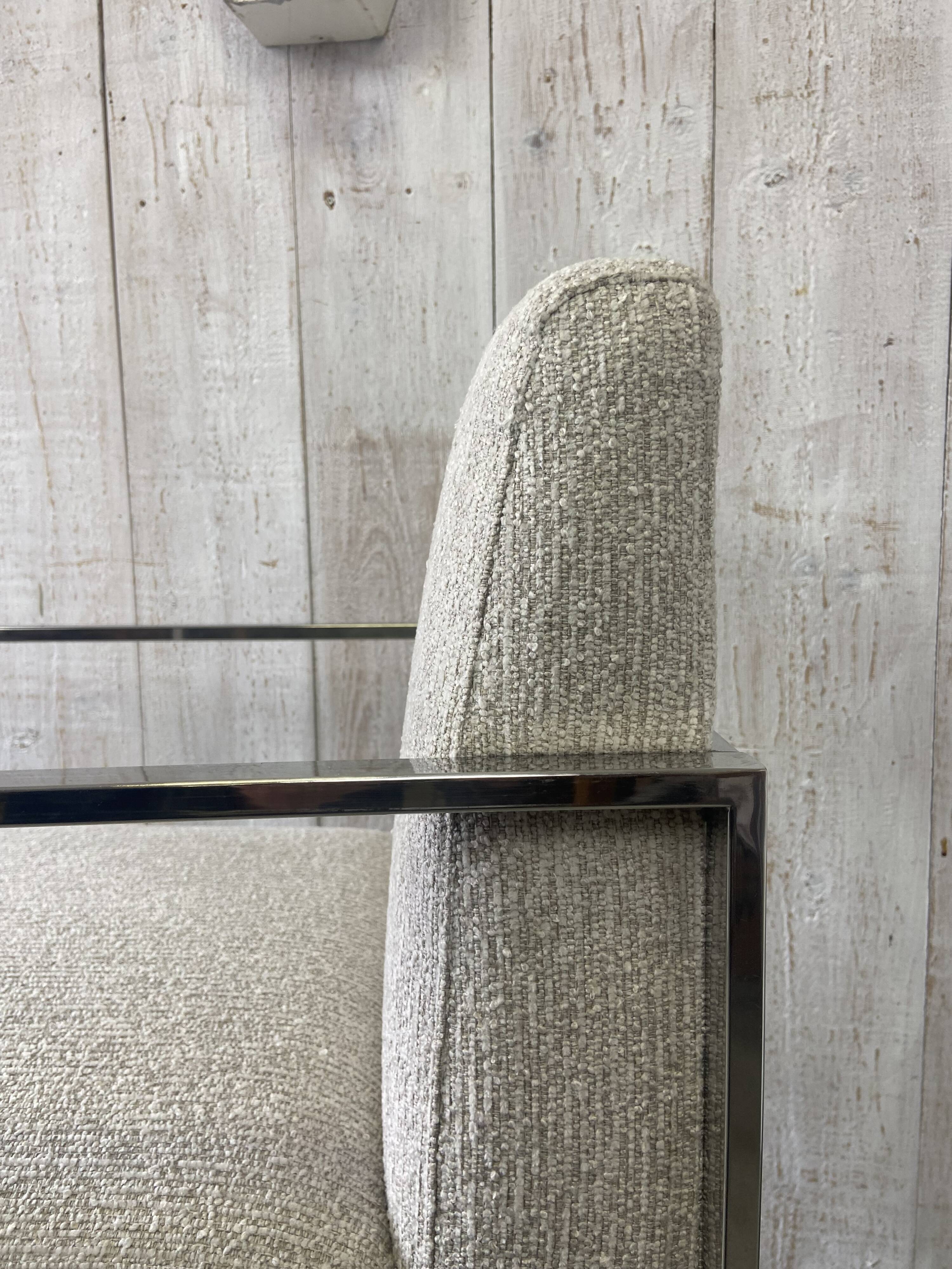 Pair of stainless steel armchairs from the 70s