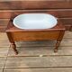 Antique bidet circa 1900, wood and porcelain