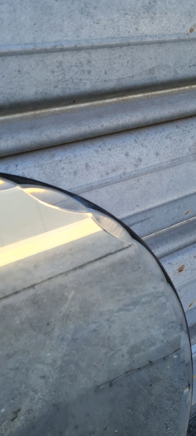 Beveled round mirror