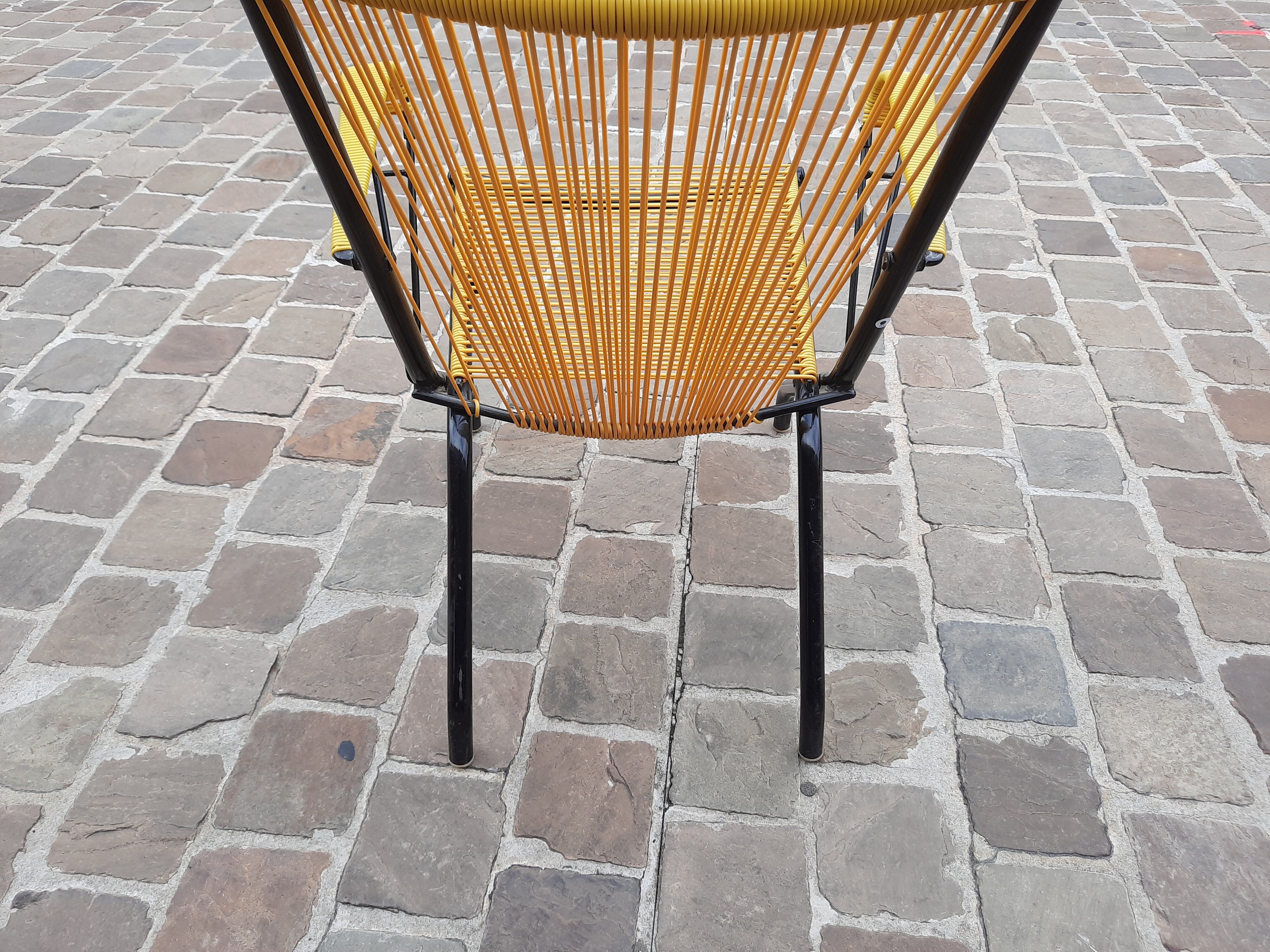 Folding chair in red scoubidou and black metal structure