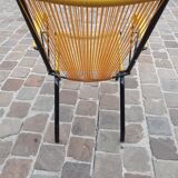 Folding chair in red scoubidou and black metal structure