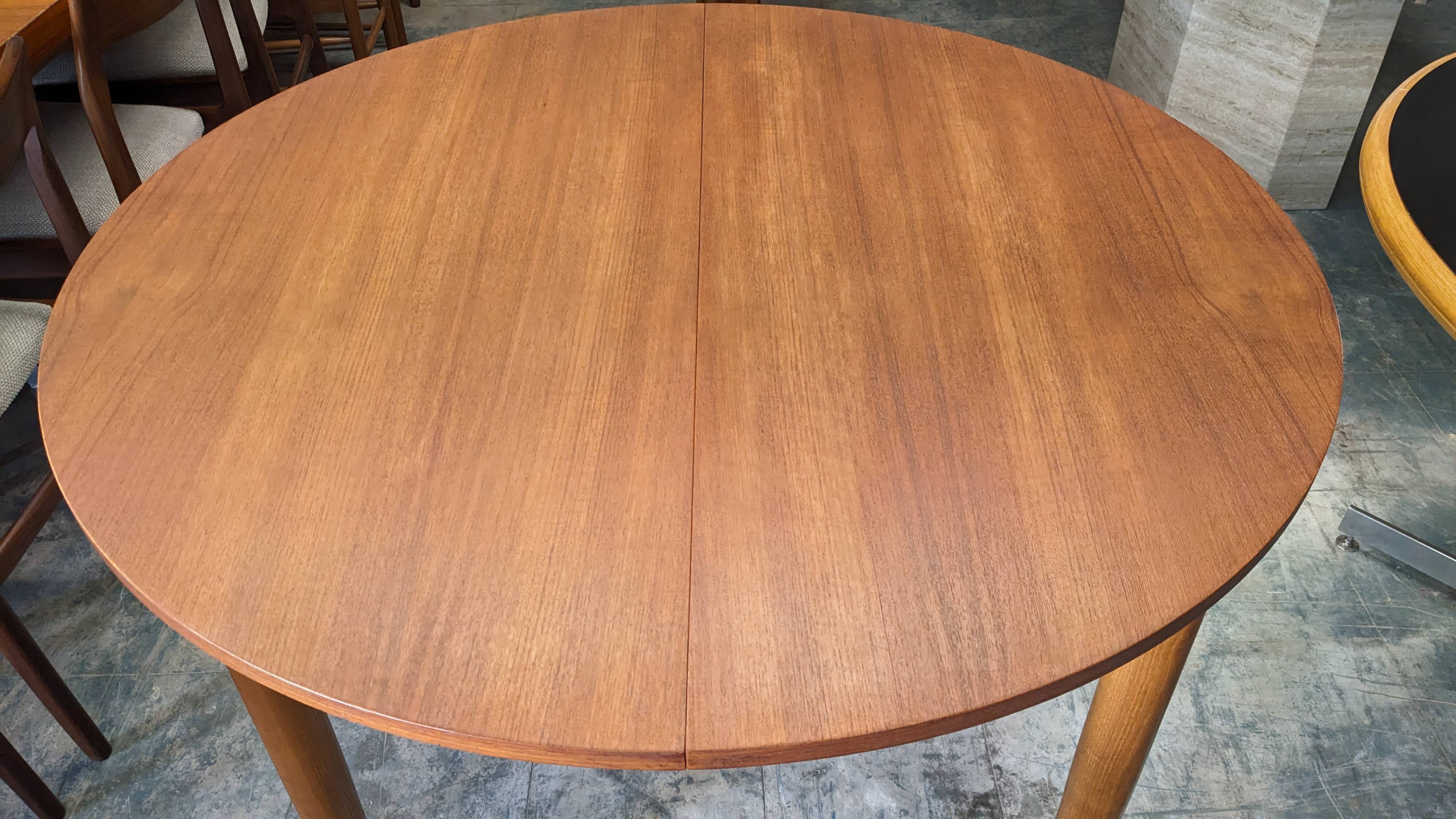 Extendable round table in Scandinavian style made of teak, France circa 1960.