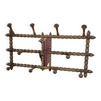 Wall-mounted coat rack in the style of Charles Dudouyt, 1950