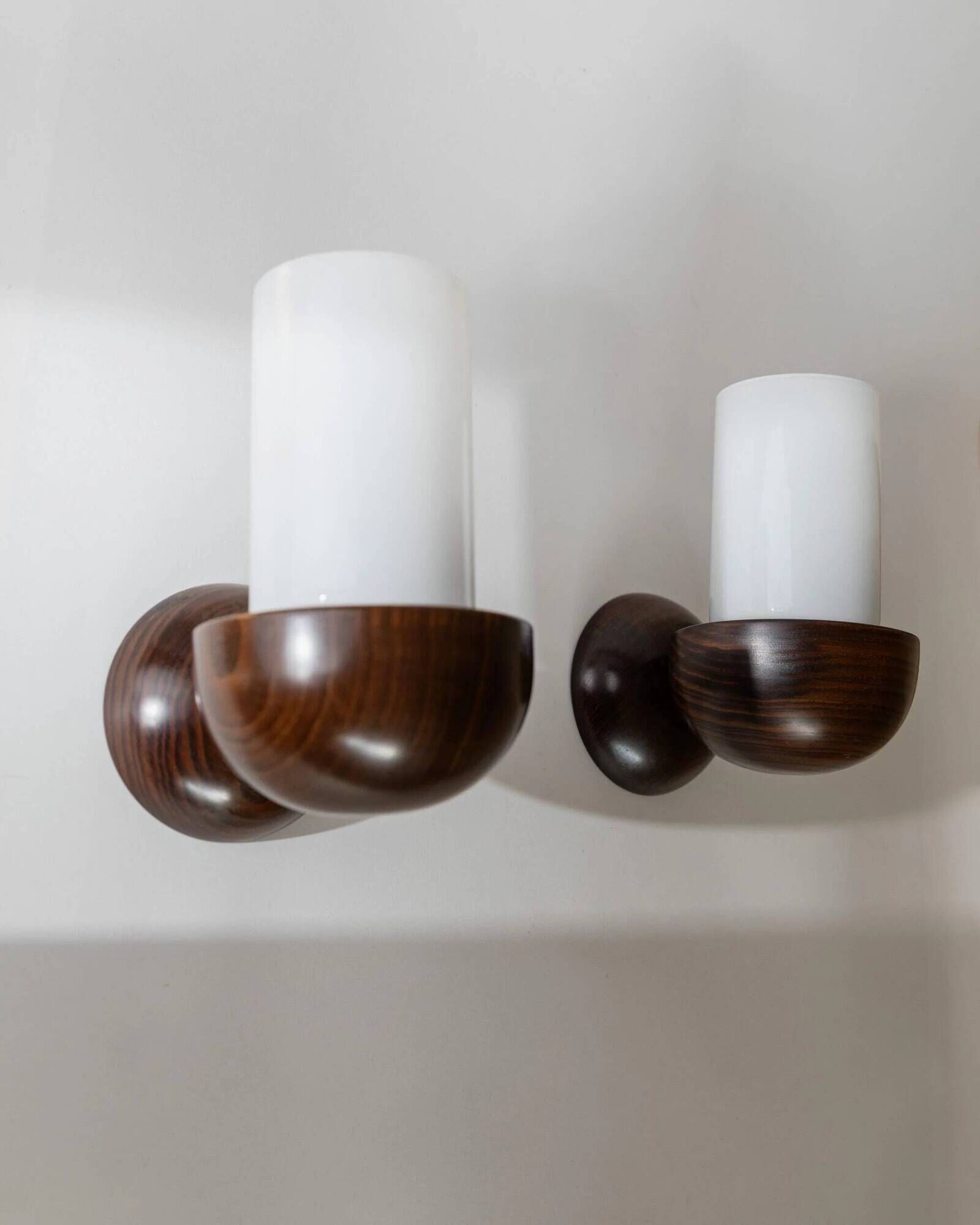 Vintage wall sconces from the 1960s, set of 2, dark wood with white glass shades, Mid-Century Modern lighting, sculptural wall sconces.