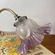 Swan neck wall light in brass with glass tulip.