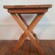 Folding stool made of solid wood