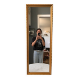 Miroir allongé en stuc doré années 60-70