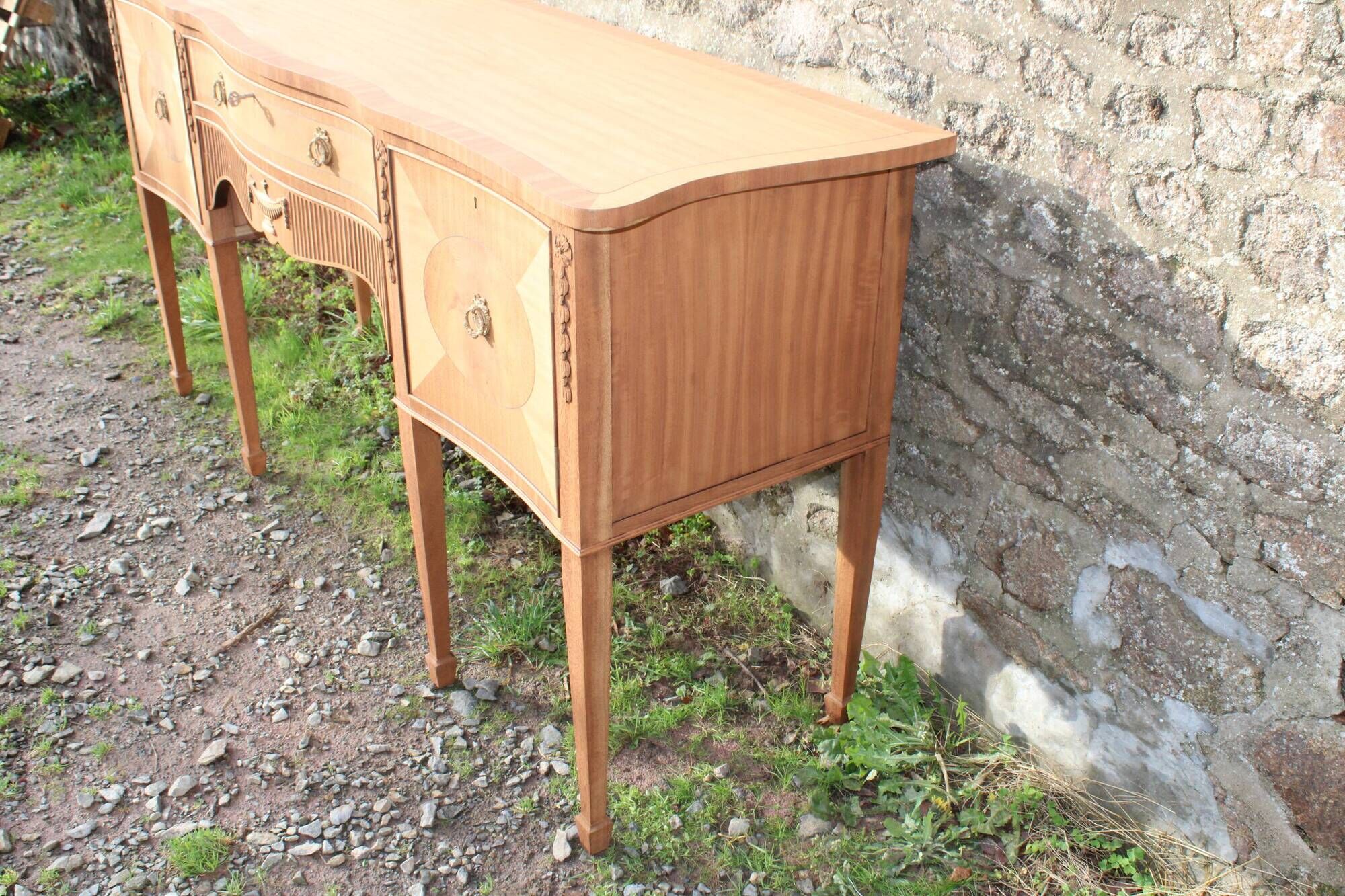 English-made enfilade in Louis XVI style with light wood veneers.