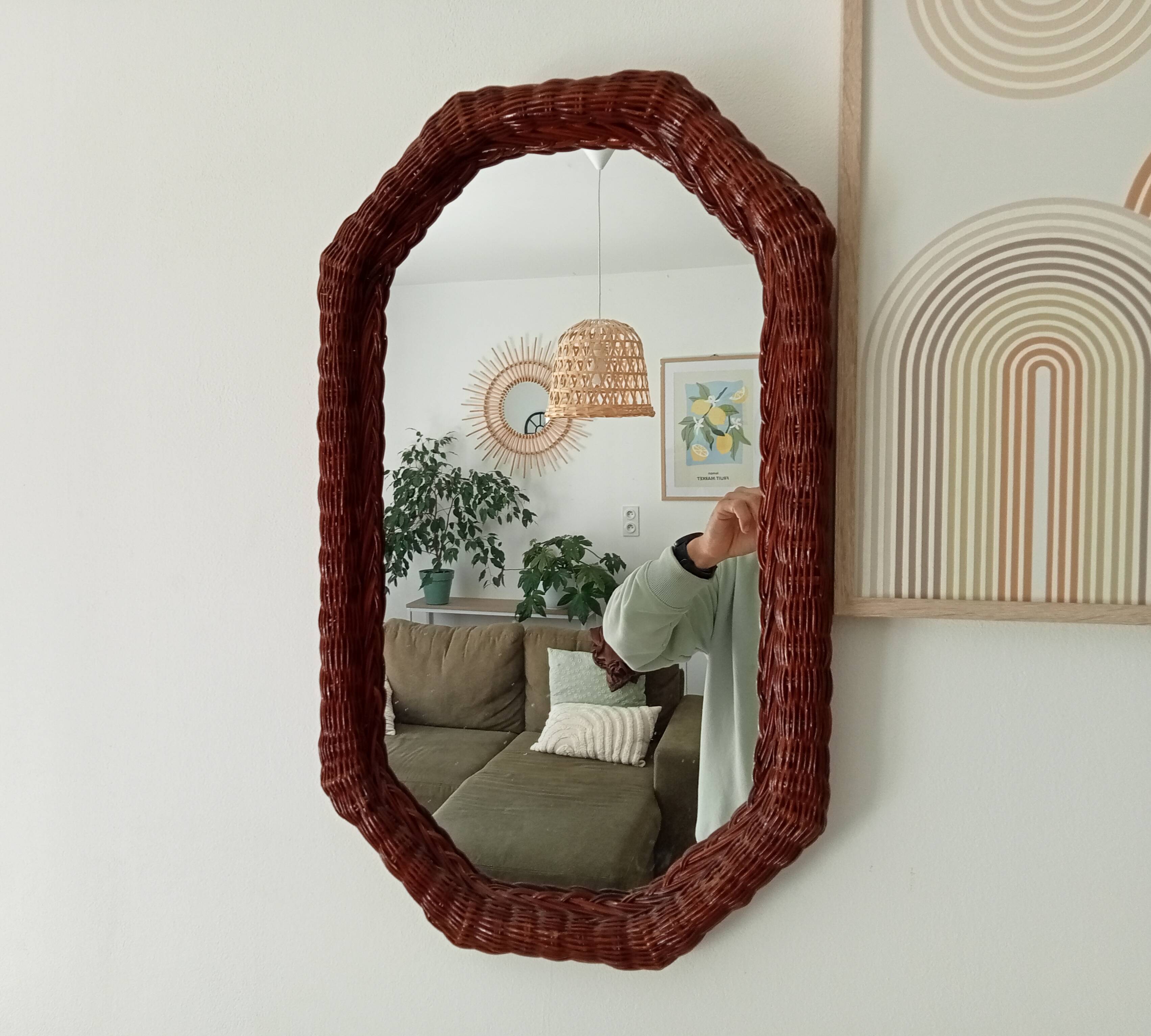 Vintage octagonal mirror in woven rattan.