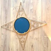 Miroir étoile doré en métal – décoration murale de charme