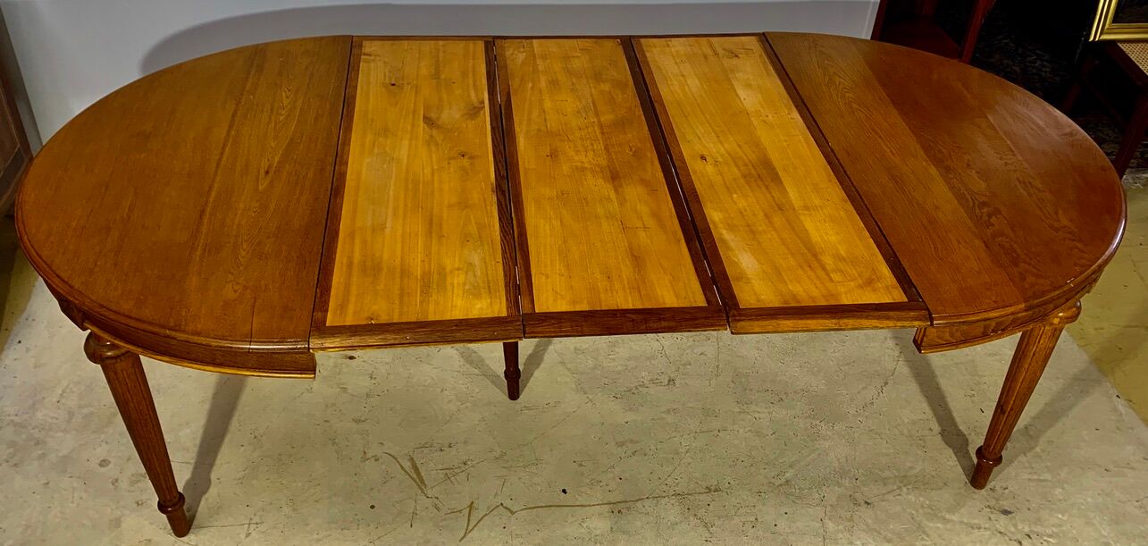 Louis XVI style table in oak with three extensions