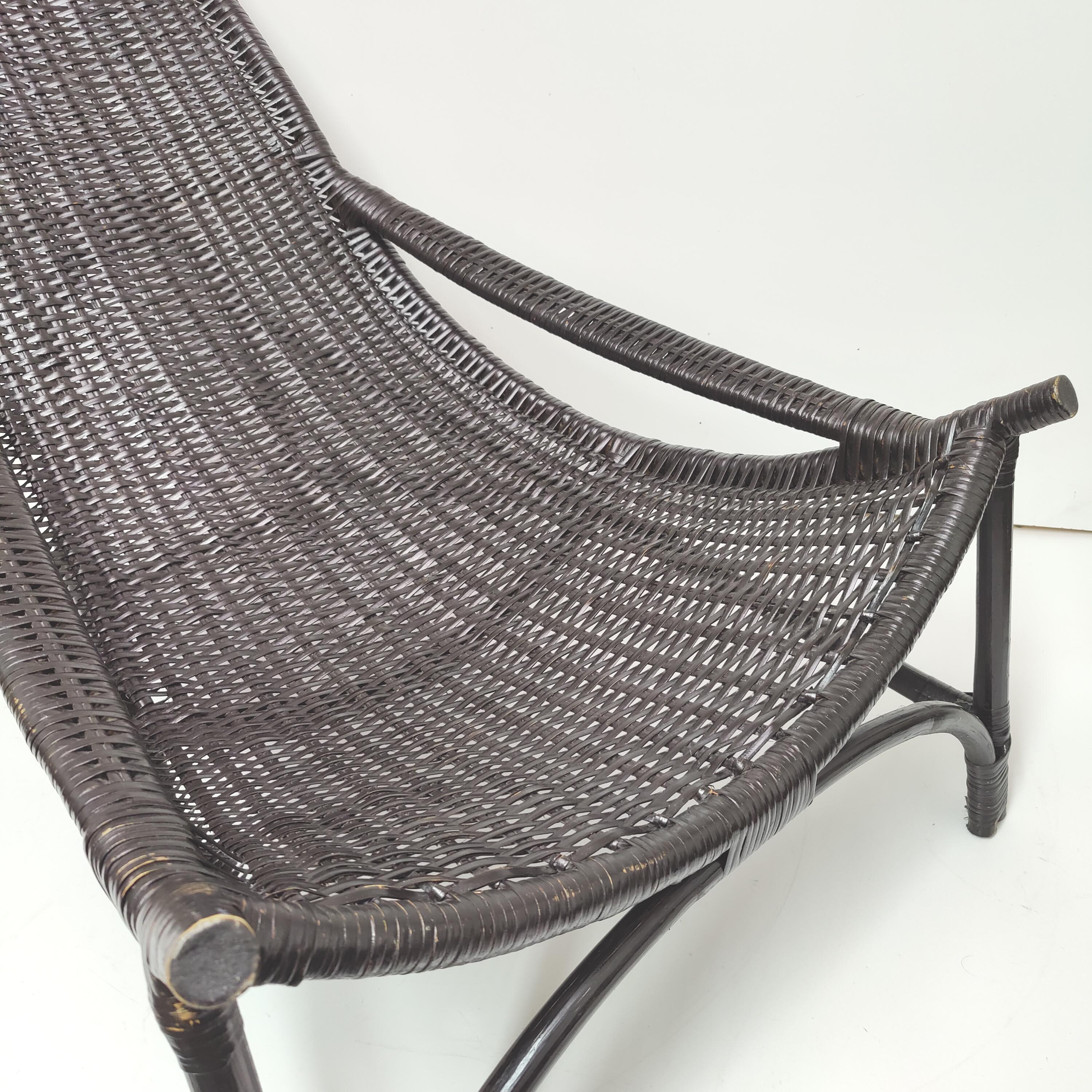 Vintage black rattan deck chair