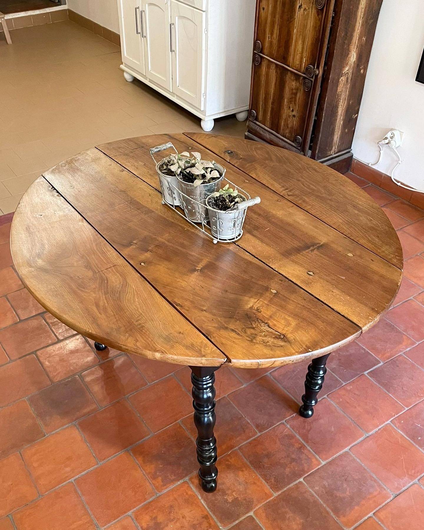 Round black solid oak flap table