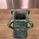 Vintage brutalist ceramic vase with 4 green handles.