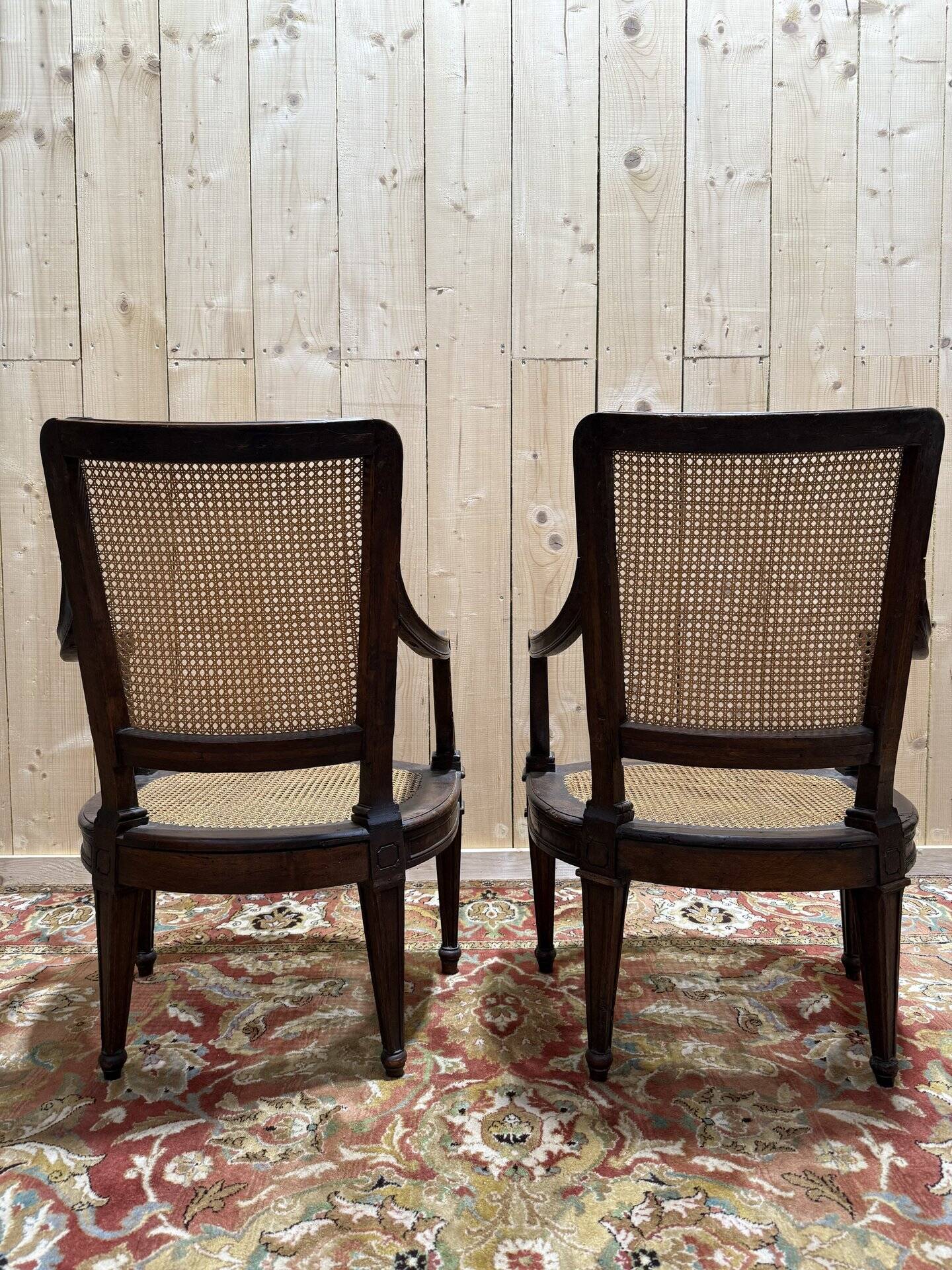 Pair of Louis XVI period caned armchairs