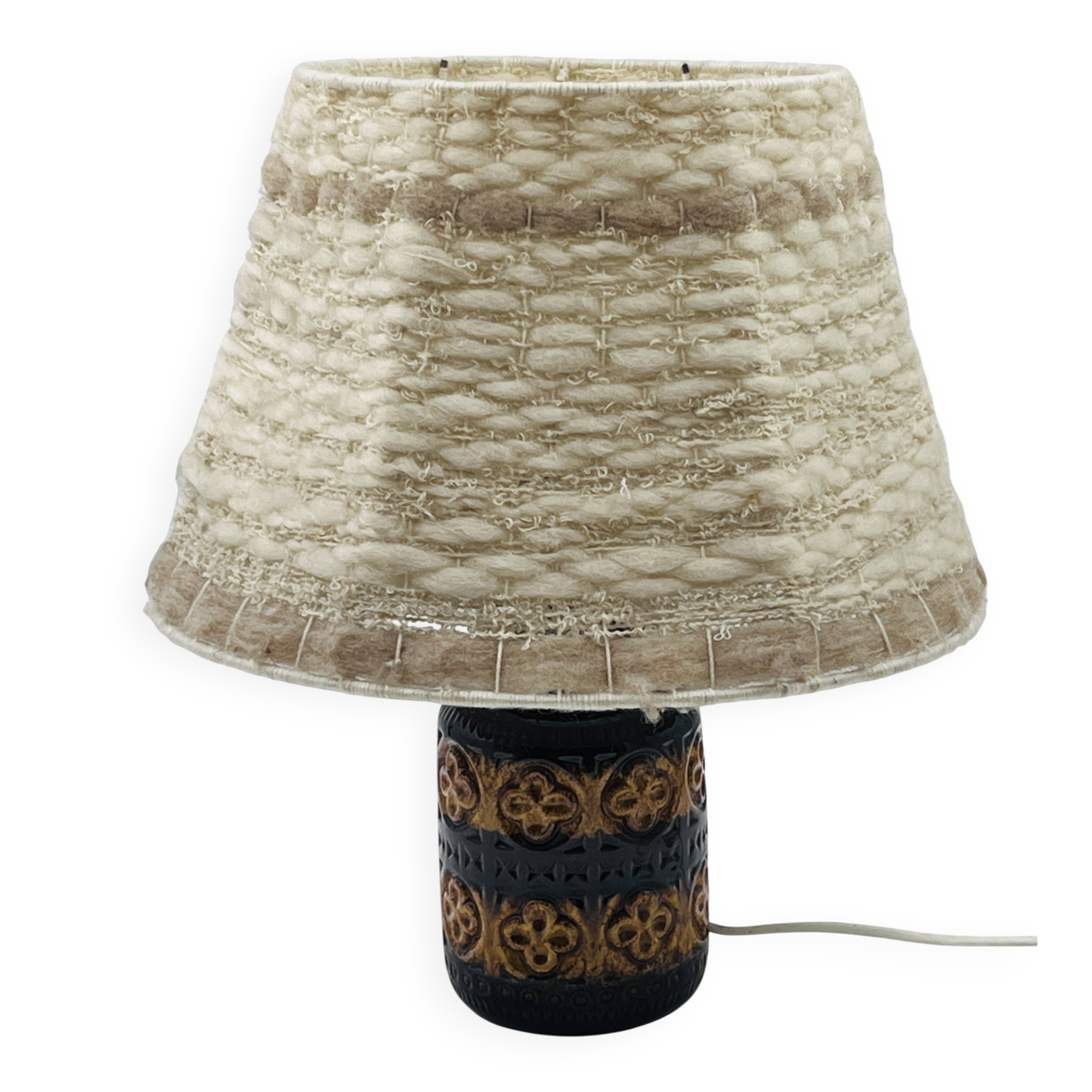Vintage ceramic lamp with relief and wool shade.