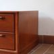 Small piece of furniture with 2 drawers in teak, bedside table or end table.