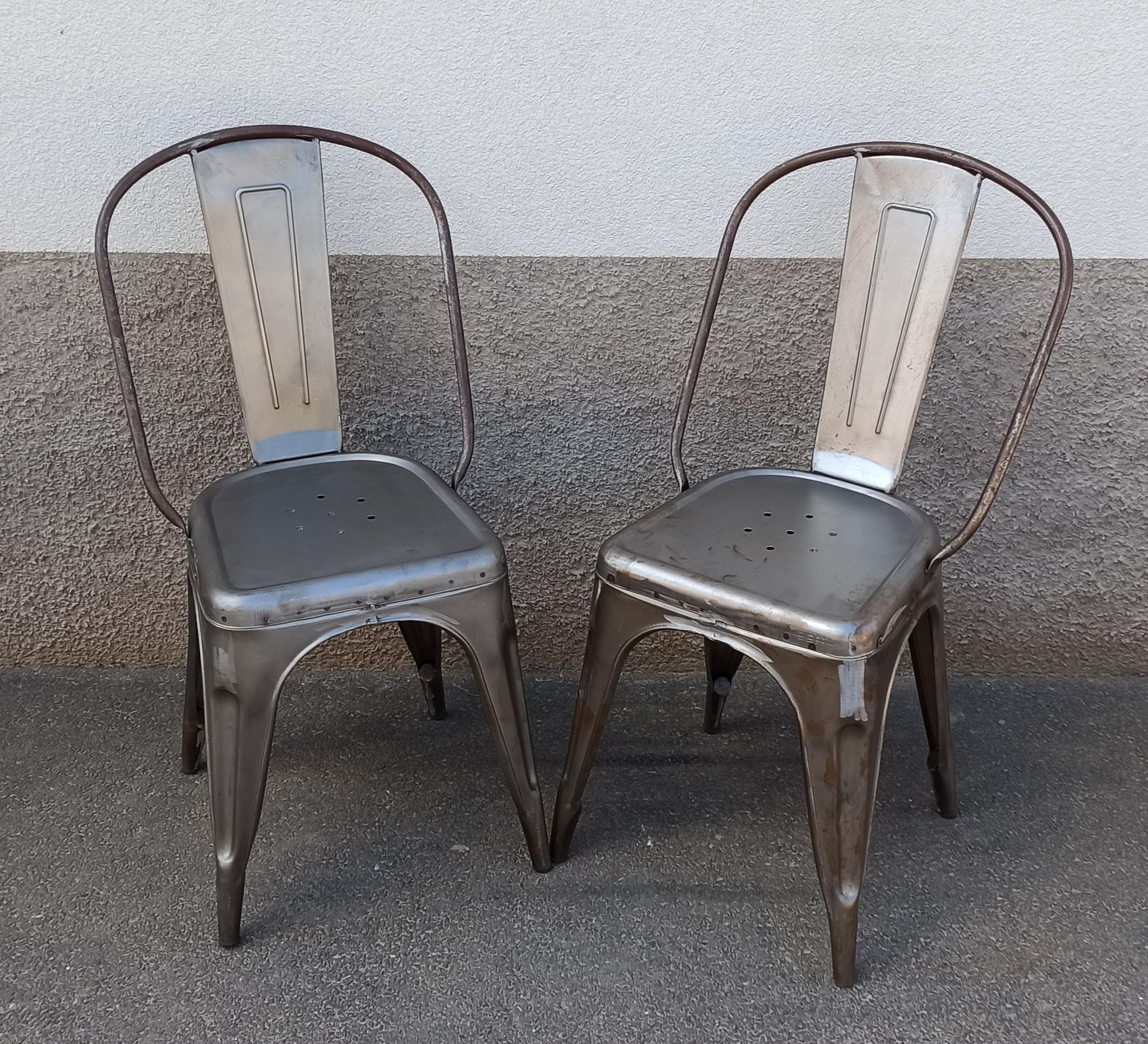 Pair of grey metal chairs