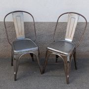 Pair of grey metal chairs