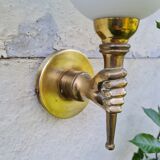 Hand-to-torch wall lamp