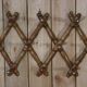 Old turned wooden wall coat rack
