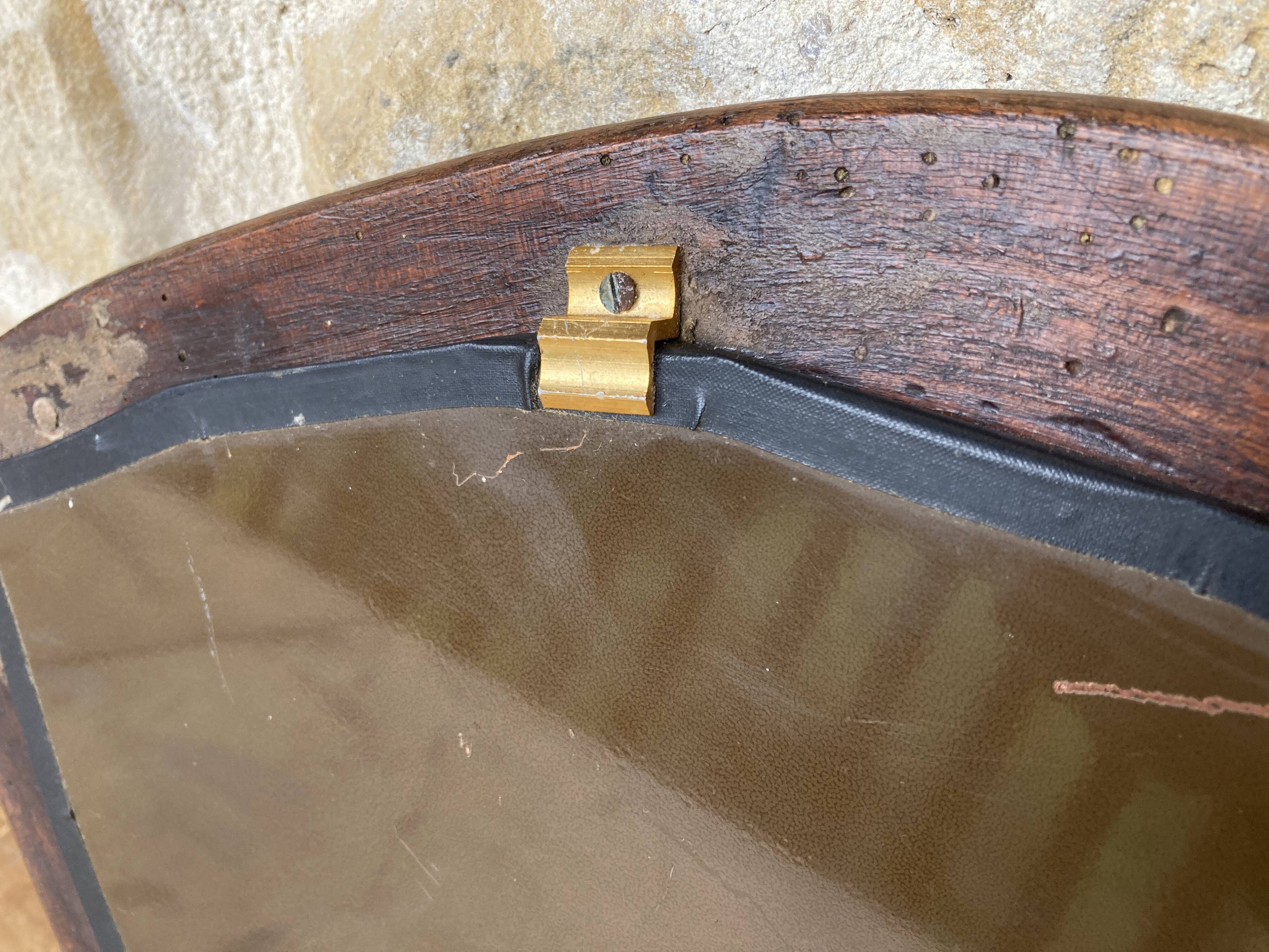 Mirror with fish-shaped wooden frame