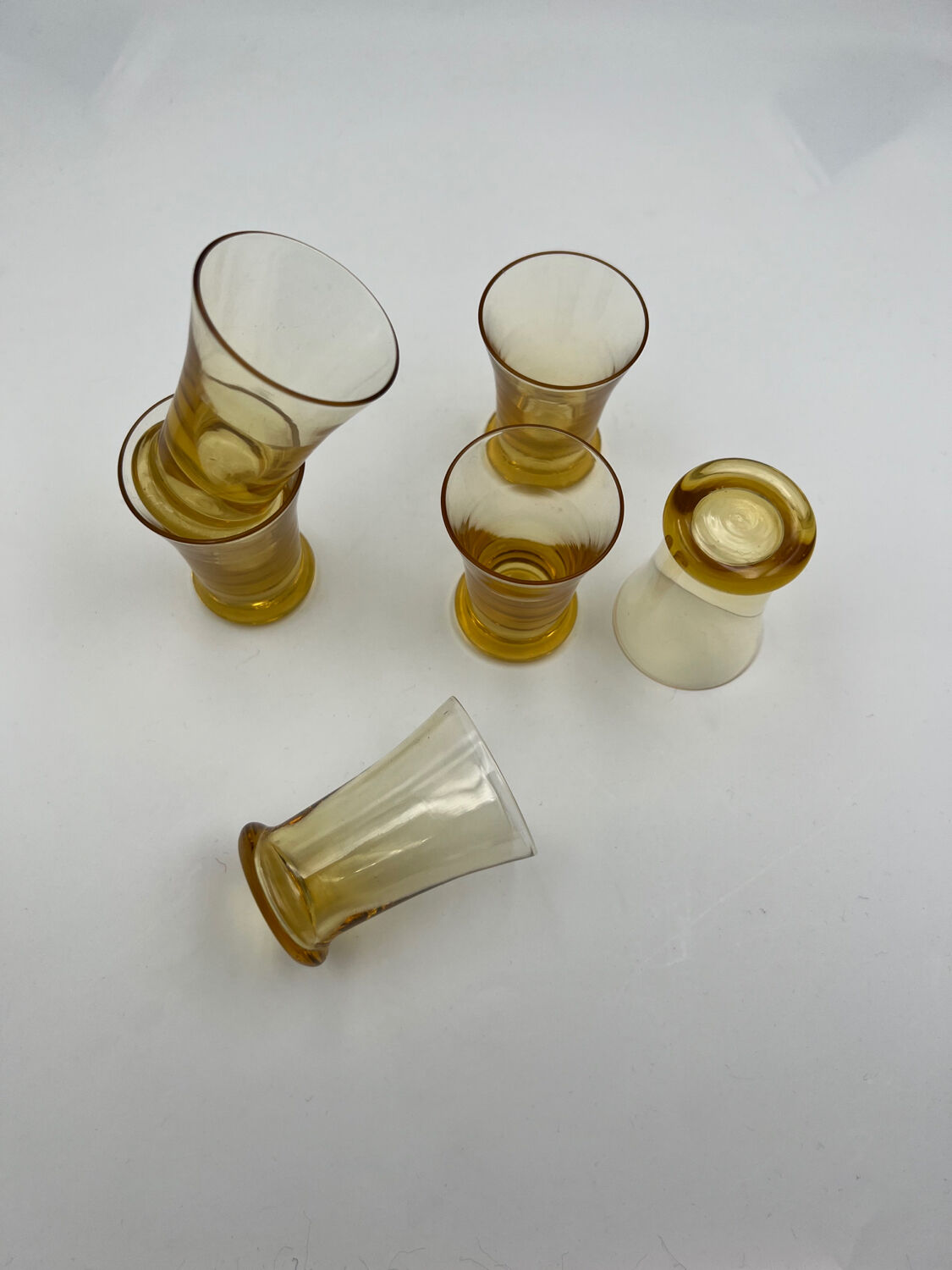 Six yellow glass shooting glasses