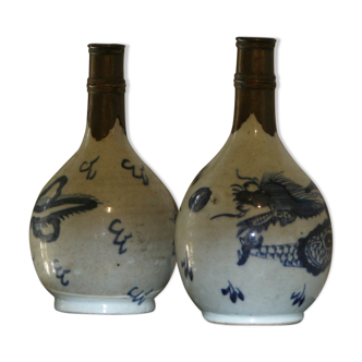 Two chinese porcelain and silver gourds