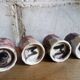 Six old yoghurt pots in enamelled porcelain
