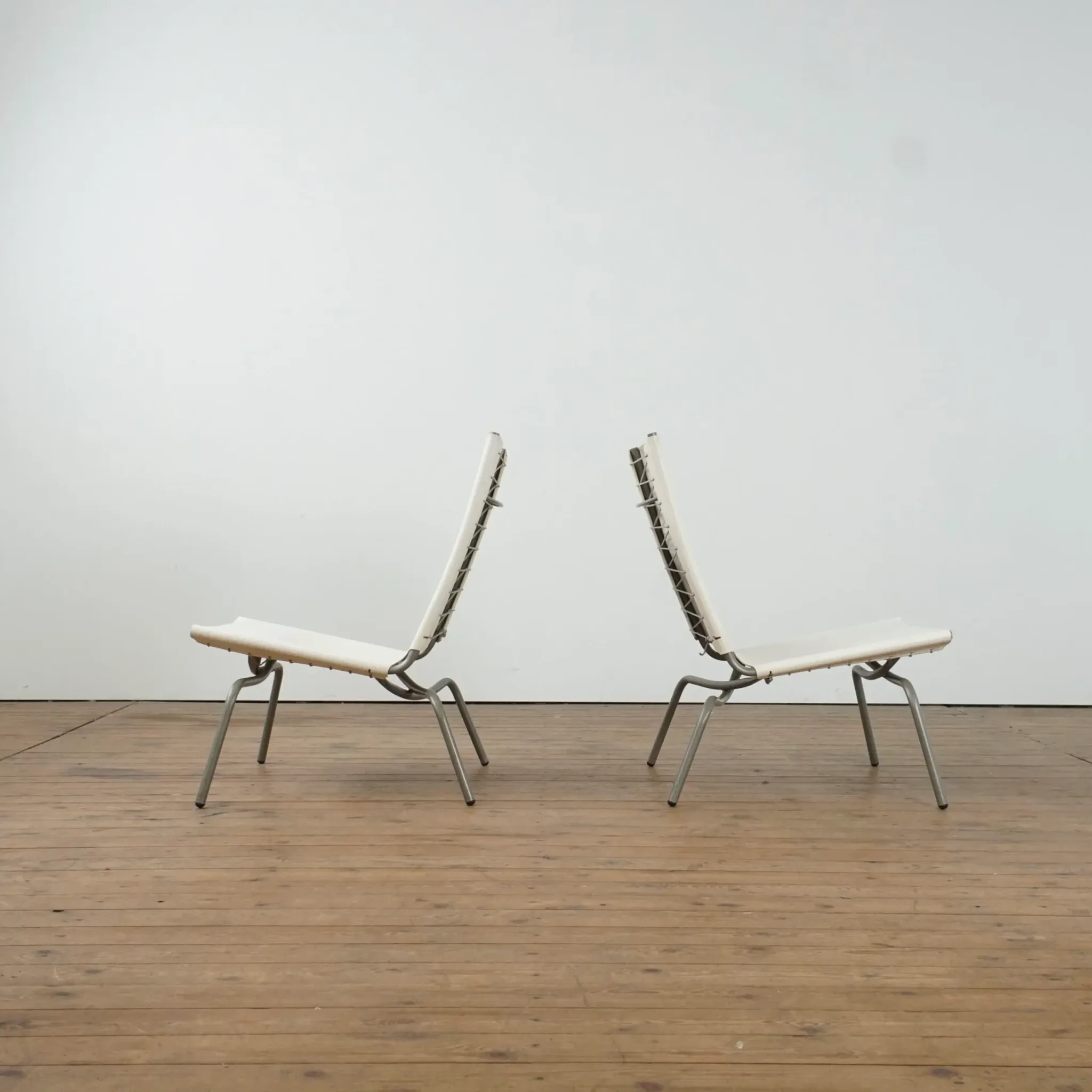Set of 2 Crossed Legged lounge chairs by Fabiaan van Severen.