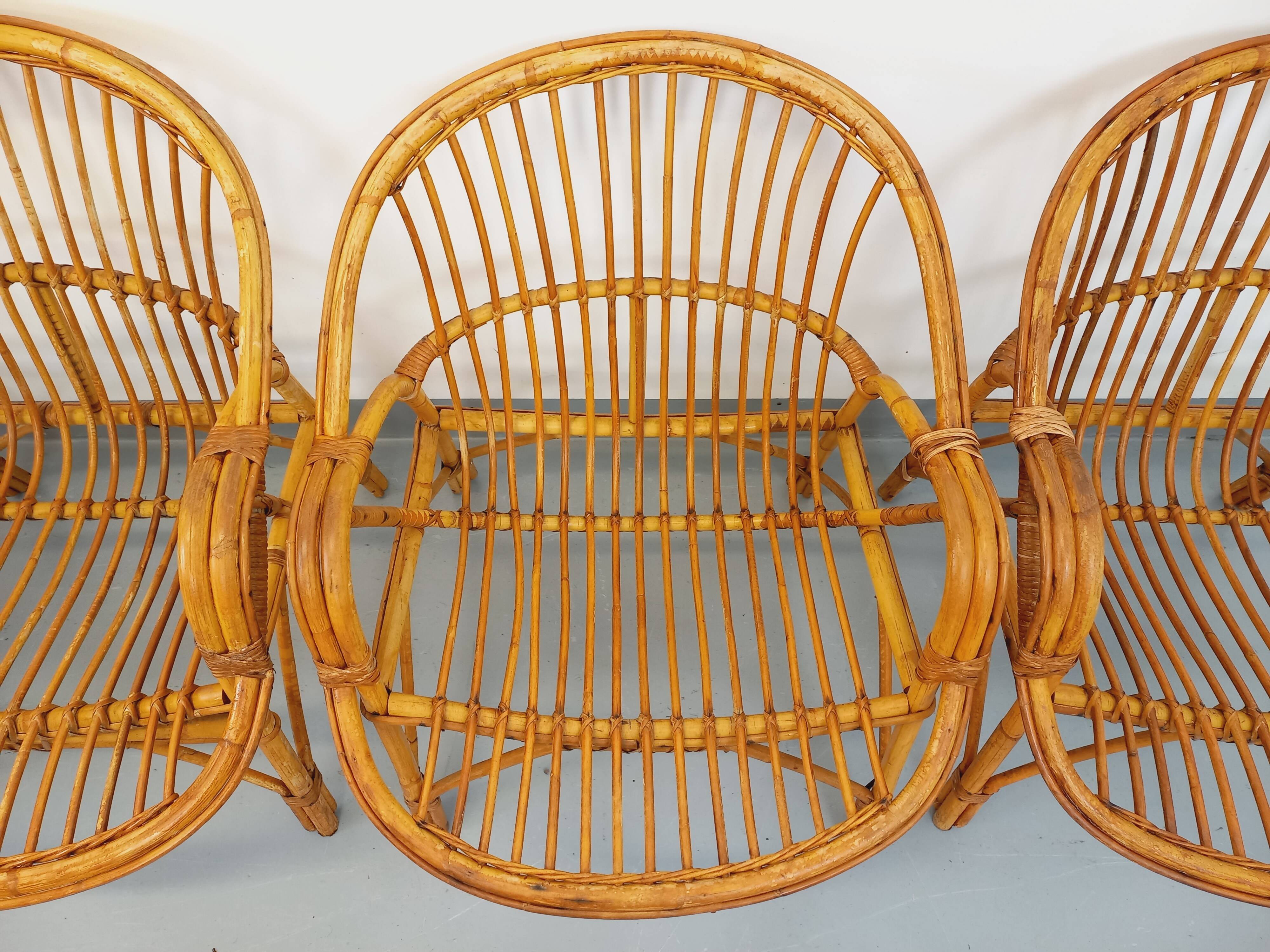 Set of 4 vintage rattan armchairs from the 60s