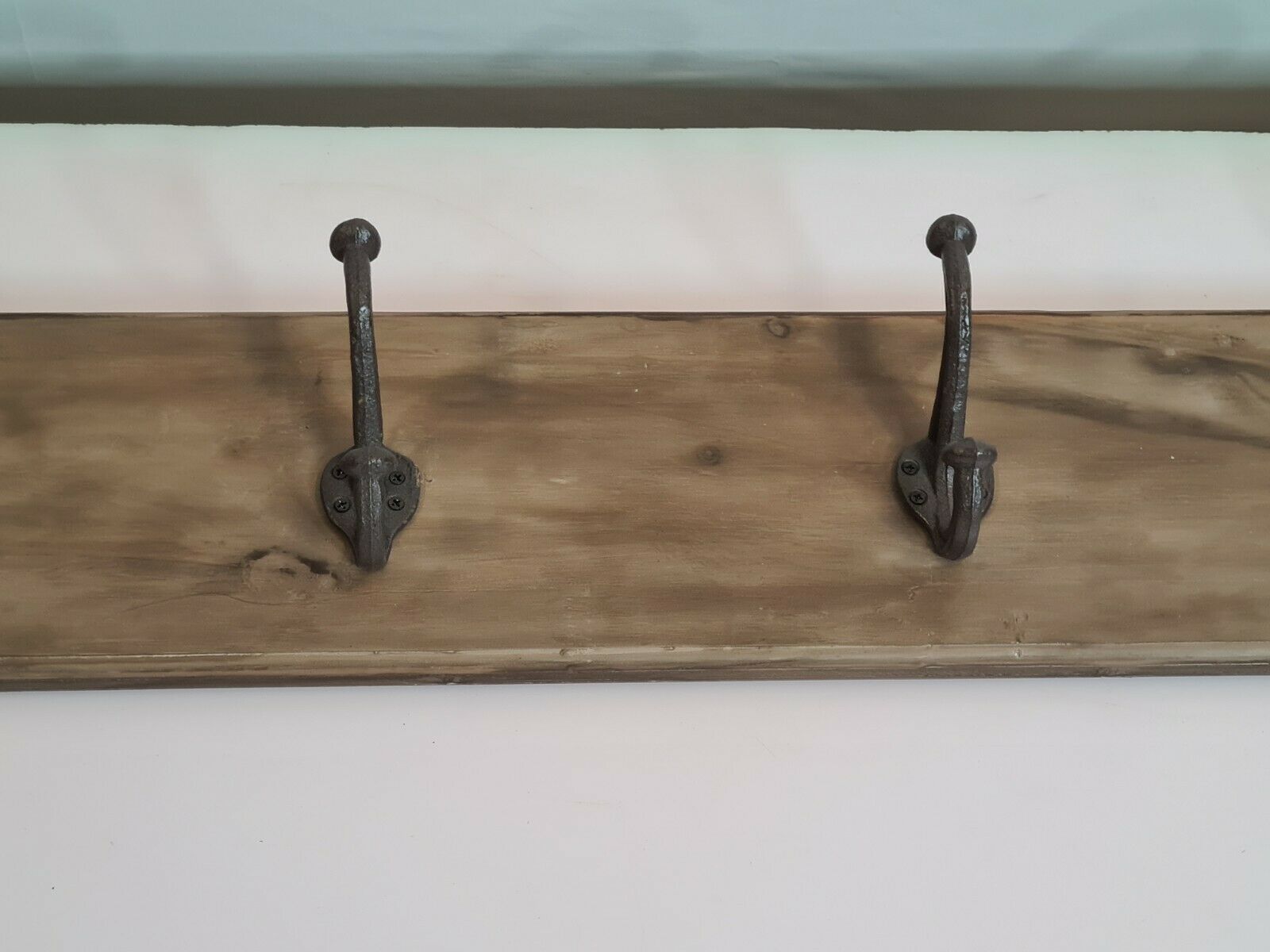 wooden school coat rack and iron hooks