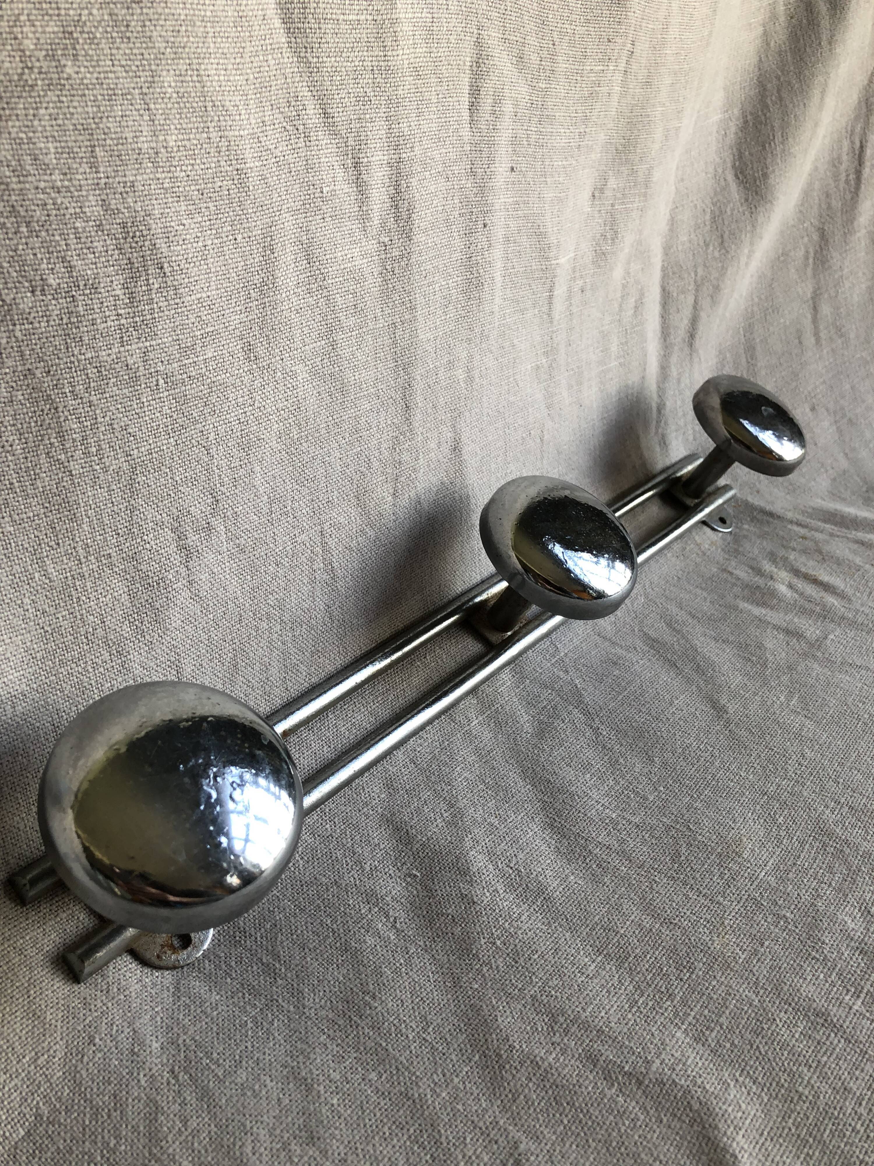 Metal wall coat rack