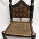 Traditional low chair in wood and leather