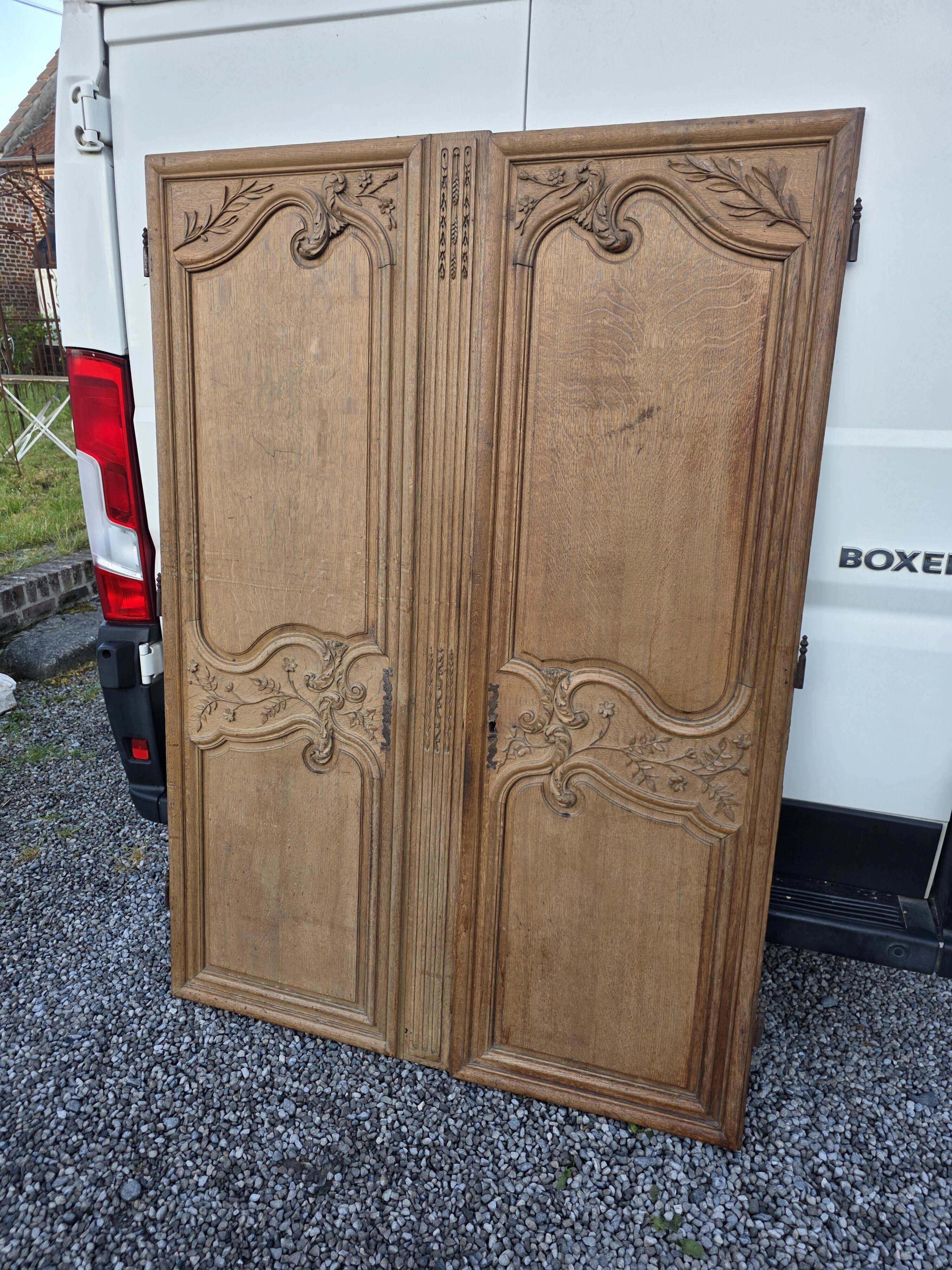 Pair of solid oak wardrobe doors from the 19th century.