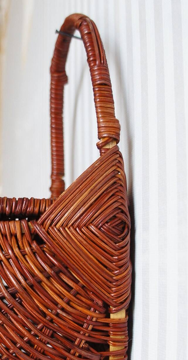Woven rattan wall basket