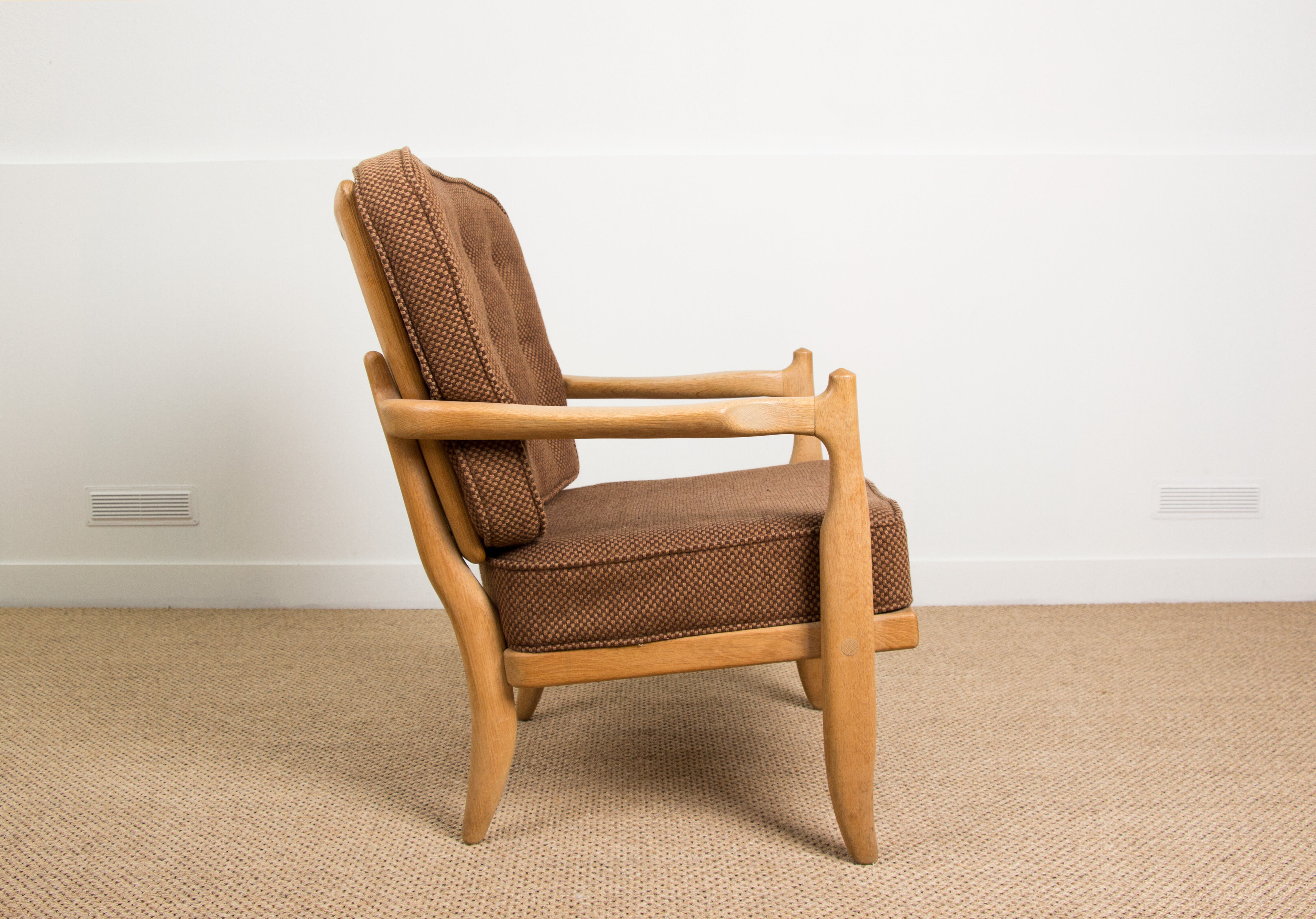 Armchair by Guillerme and Chambron.