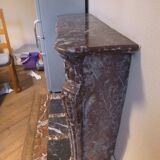 Red marble fireplace