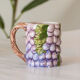 4 old mugs in Bassano slip signed
