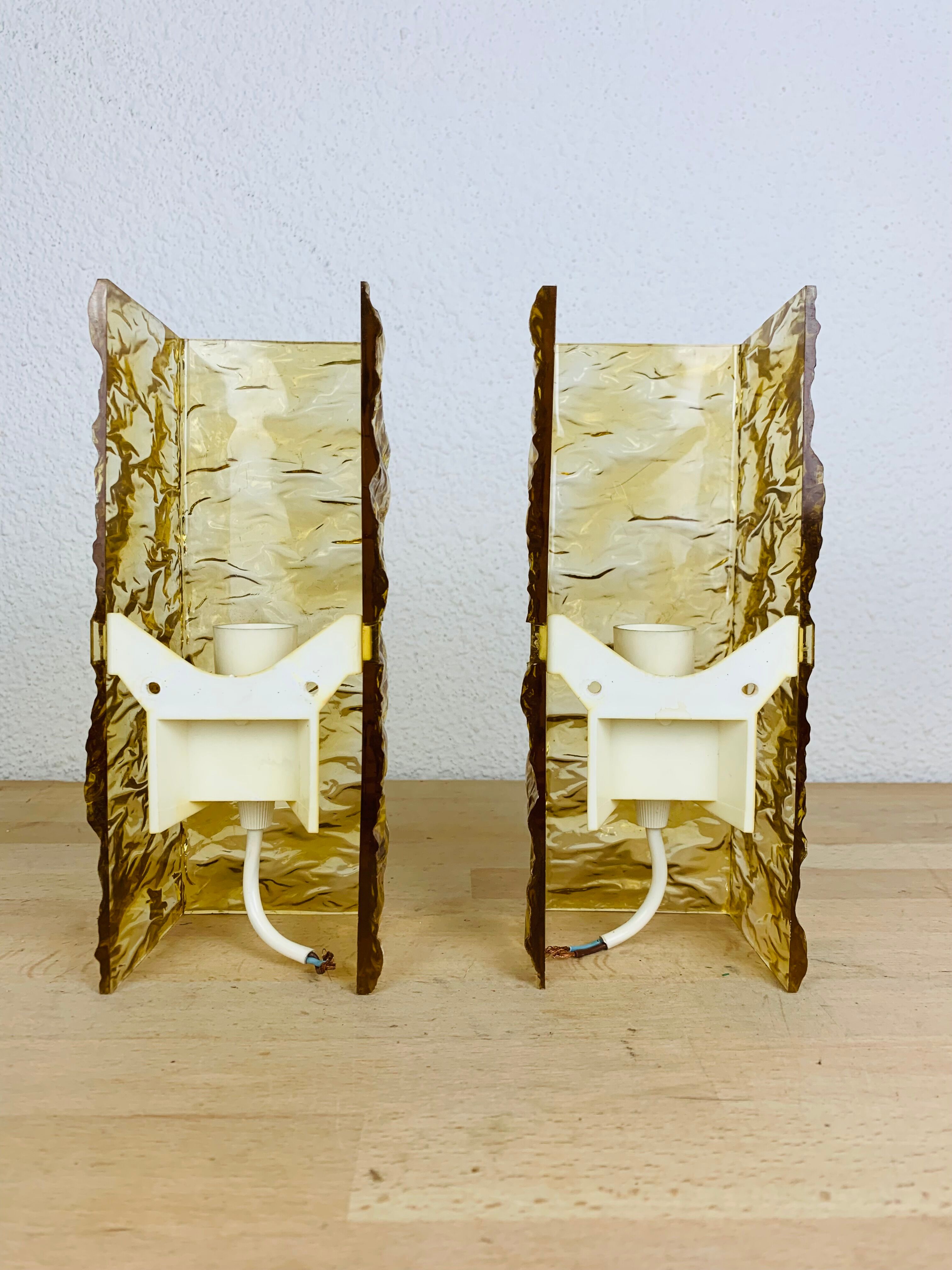 Pair of vintage amber resin wall lamps