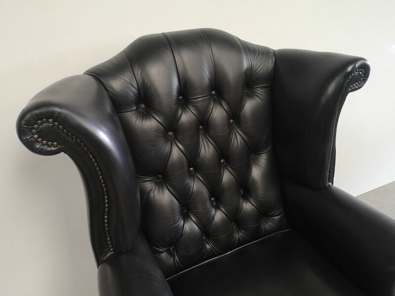 Fauteuil bergère chesterfield cuir noir