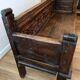 Antique carved solid wood bench from the early 20th century