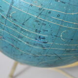 Luminous world map in tripod glass