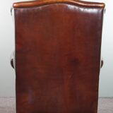 Luxurious large sheep leather wingback armchair with beautiful colors and amazing patina